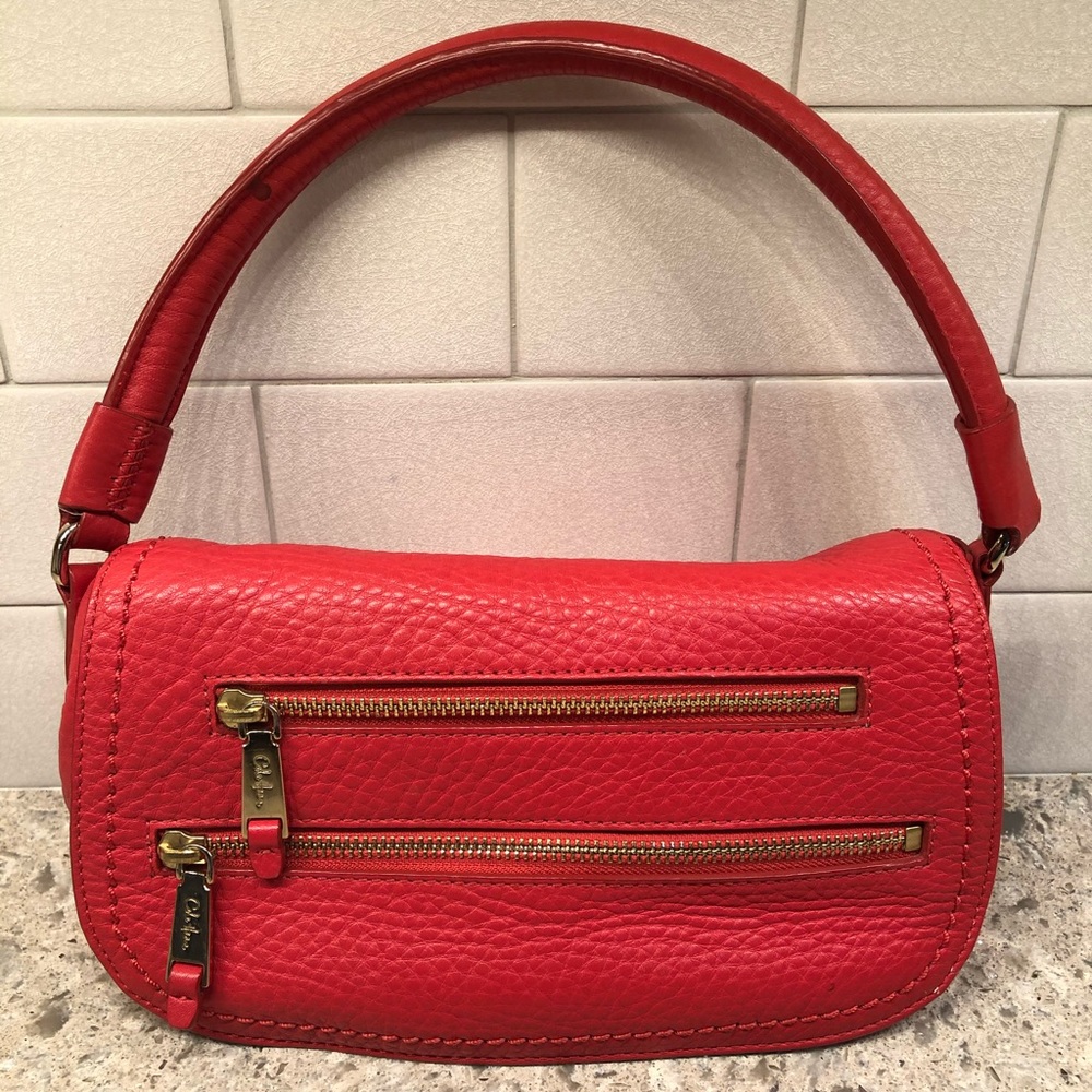 Cole Haan coral leather purse.